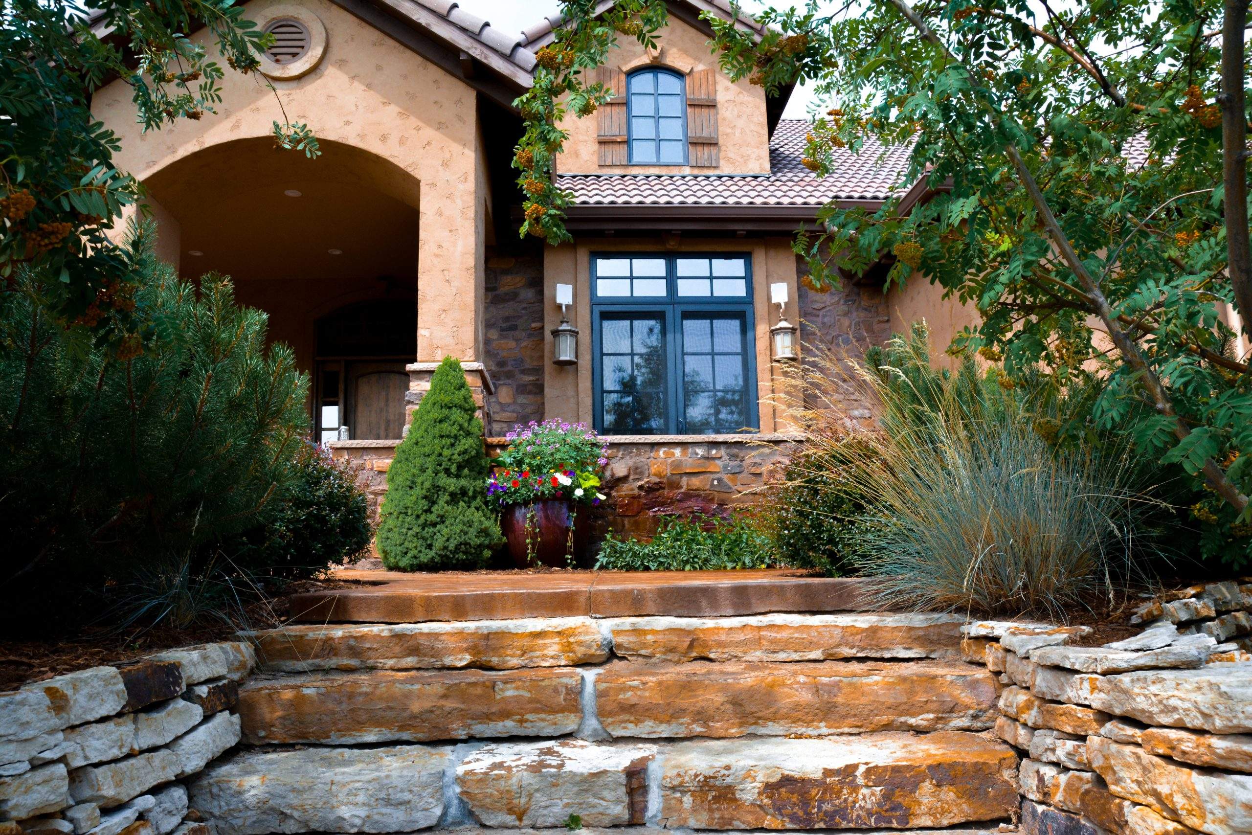 Residential Front Patio Stairs with Maintained Landscape