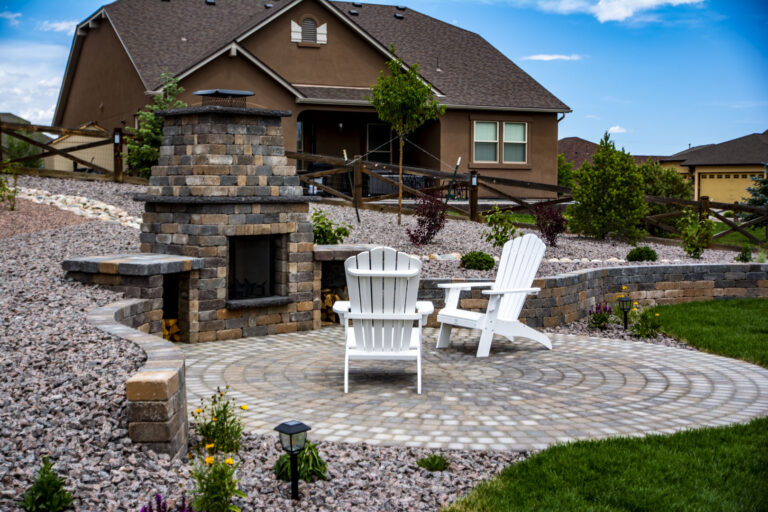 xeriscaping around a stone fireplace