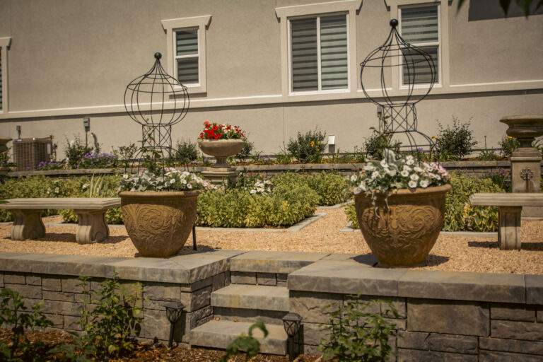 stone steps to garden with flowerpots