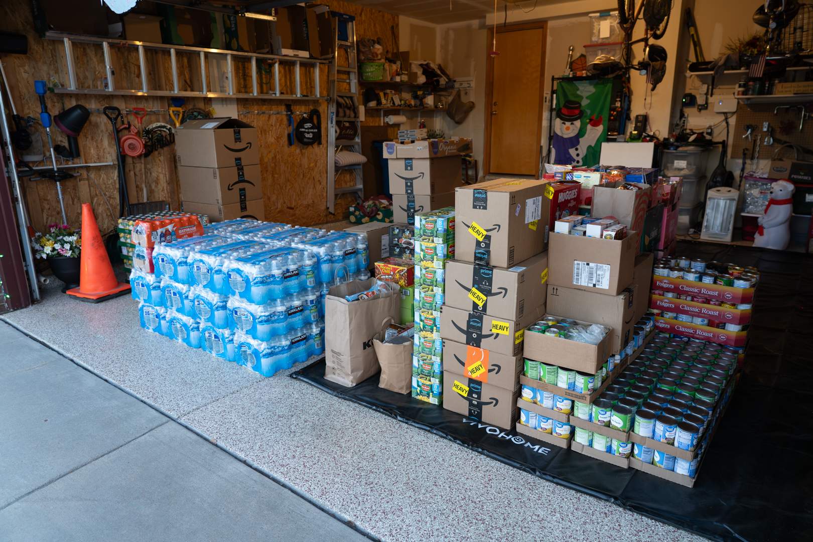 Food donations to Care and Share from a Colorado Springs Home's Christmas Lights Display