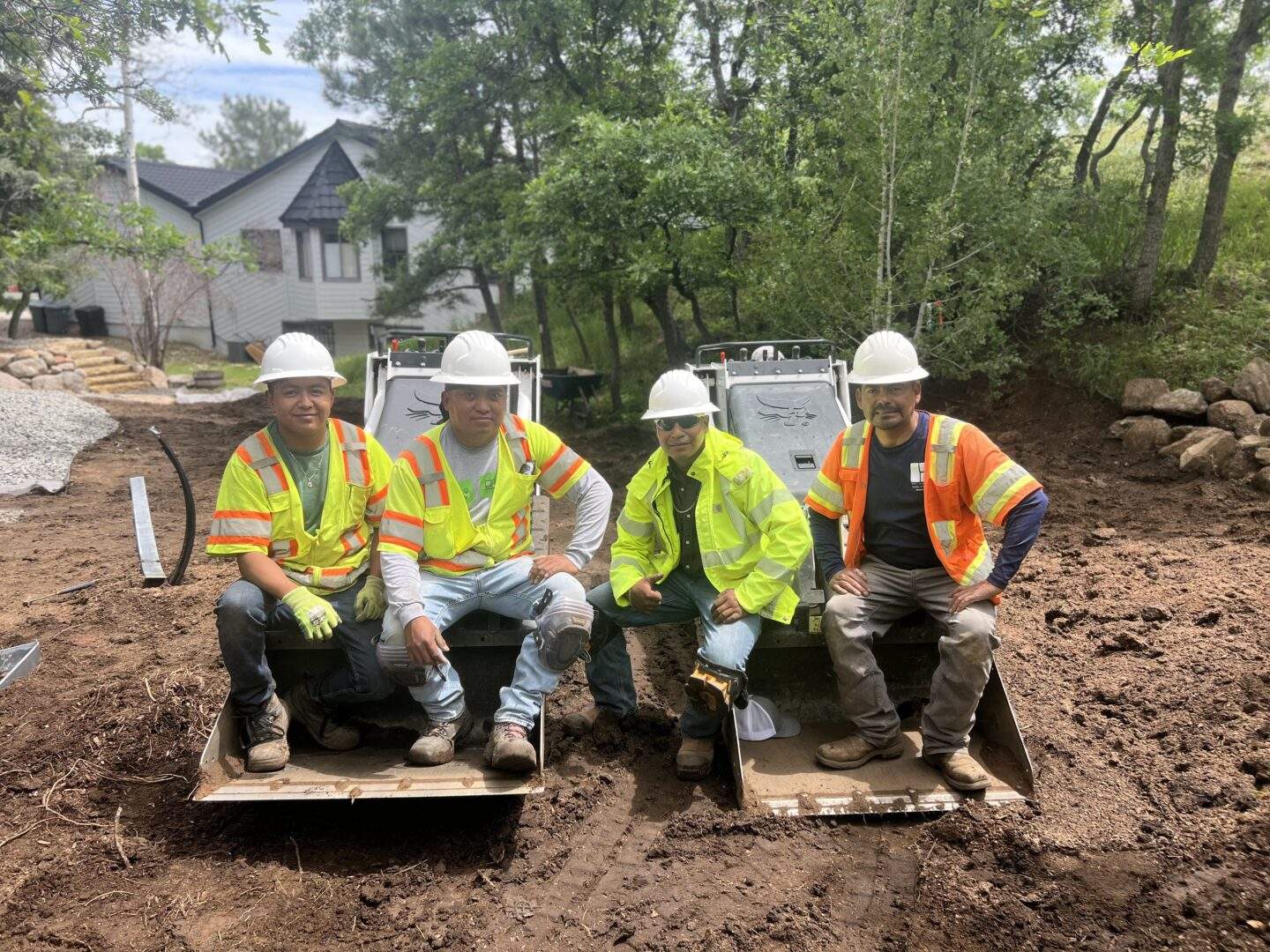 Landscape Contractor and Landscape Crew working together