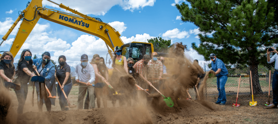 shovels groundbreaking dirt in the air panorama park